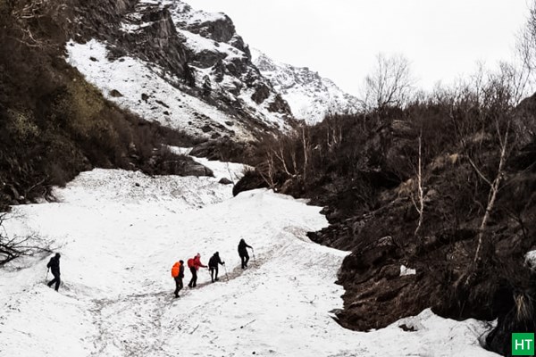 walk-towards-har-ki-dun-on-snow-early-summer